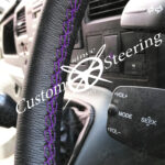FORD FIESTA MK6/7 2002-2008 GENUINE BLACK BEST QUALITY ITALIAN LEATHER STEERING WHEEL COVER PURPLE STITCHING